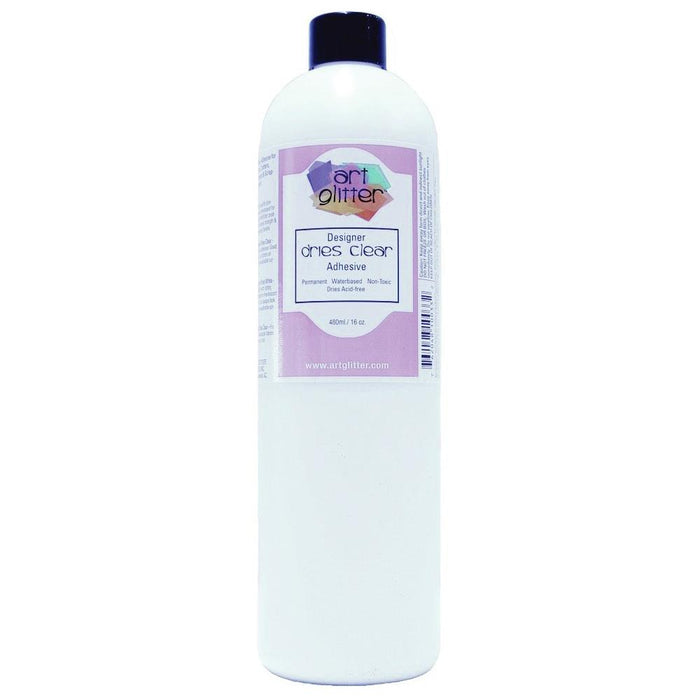 ART INSTITUTE GLITTER-Designer Dries Clear Adhesive is an industrial strength adhesive that adheres to the following: paper art, acetate transparency, cling vinyl, acrylic, ceramics, feather quills, wood, metal, polymer clay, shrink plastic, artificial and dried floral, glass, beads, rocks, shells, and non-washable fibers. Dries acid-free and remains permanently flexible. Available at Embellish Away located in Bowmanville Ontario Canada.