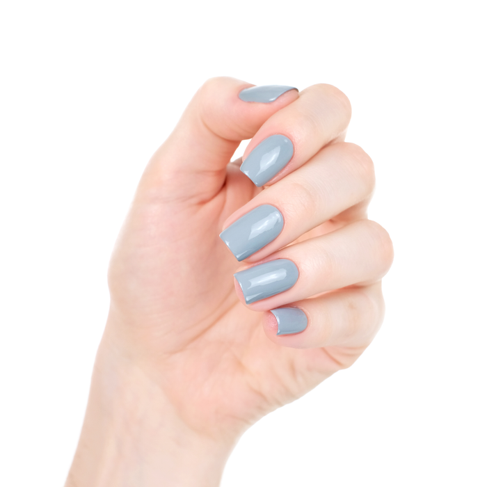 Grey Skies cool grey nail polish manicure on a light skin tone