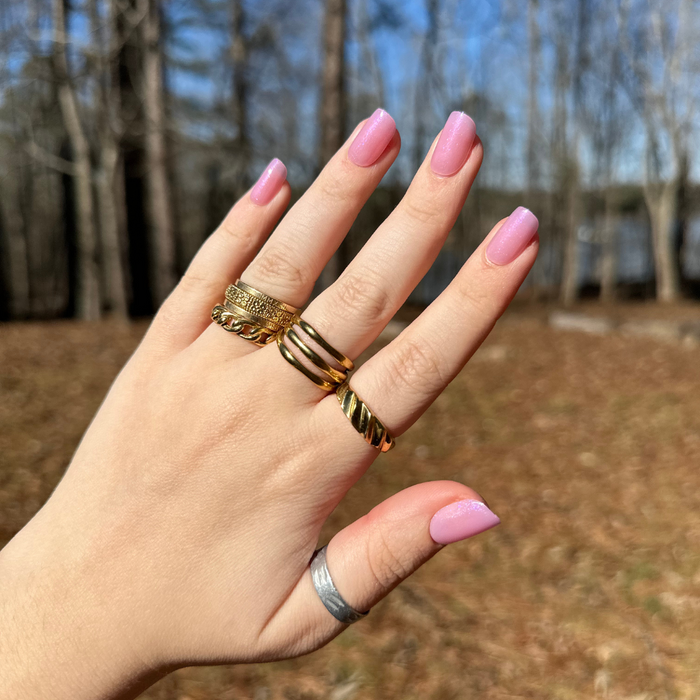 Island Time - Press-On | Short | Squoval showing hand outdoors with short squoval sheer lilac purple shimmer press-on mani