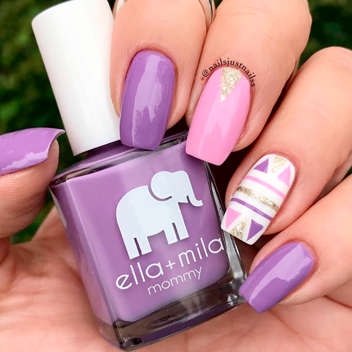 Lavender Fields purple nail polish with pink and gold striped accent nails
