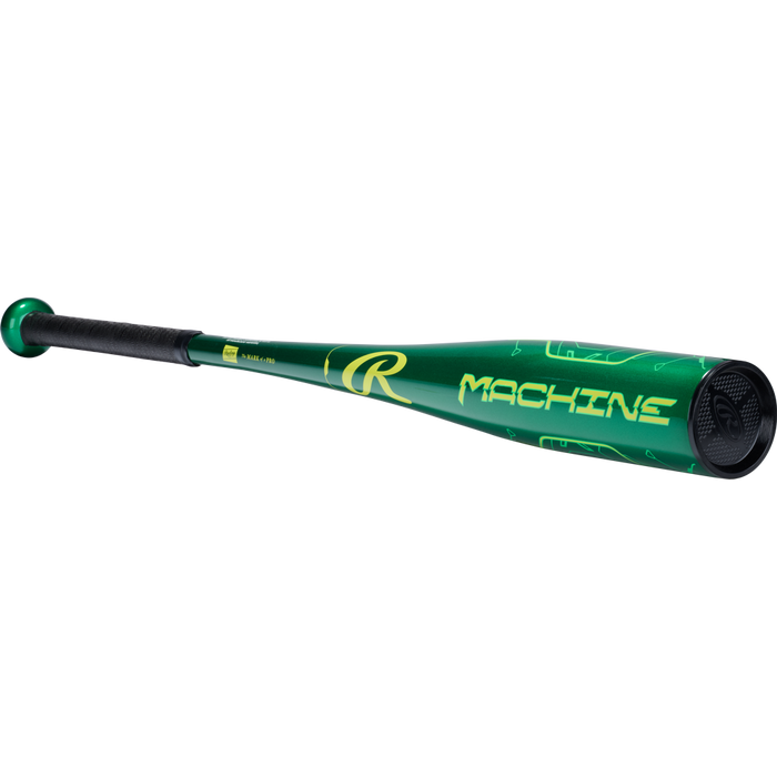 The 2026 Rawlings Machine (-10) USA Baseball Bat (RUS6M10) features a green barrel with yellow MACHINE lettering, black grip, metallic finish, and aerospace-grade alloy construction—ideal for youth baseball players.