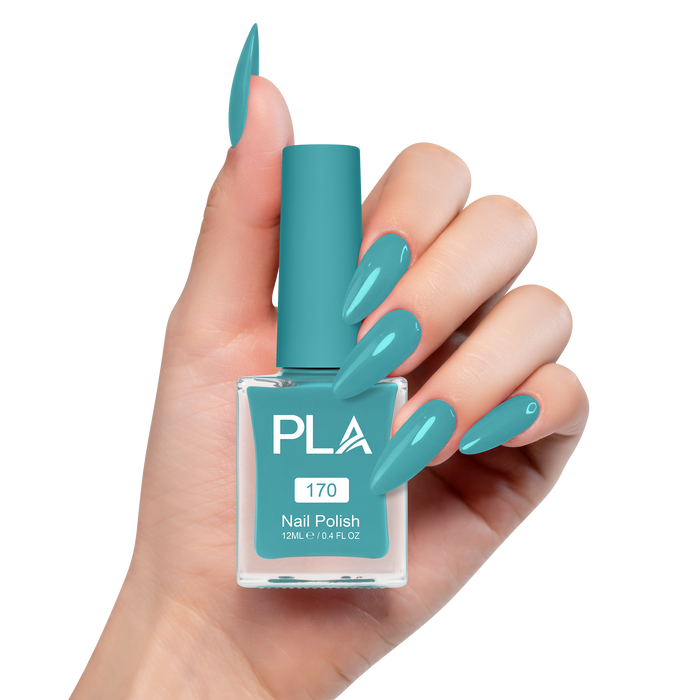 Teal nail polish bottle with matching nails held by a hand on a white background