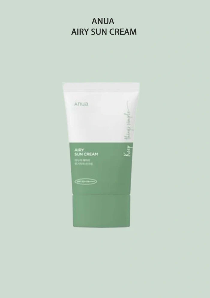 Green and white tube of ANUA Airy Sun Cream on a light green background