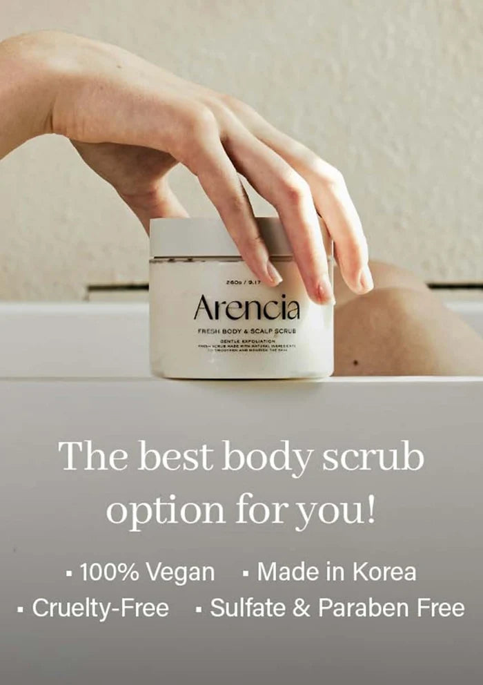 Hand holding a jar of Arencia scrub with promotional text about its benefits.