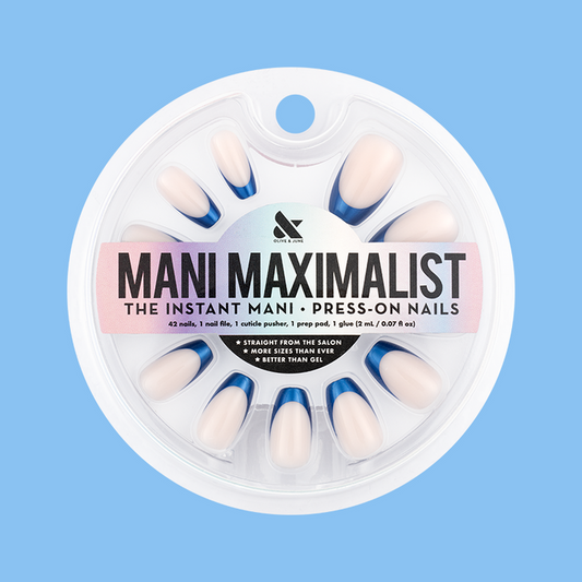 Blue Metallic French - Press-On | Medium | Coffin showing medium coffin false nails with metallic blue french tips in round packaging on blue background