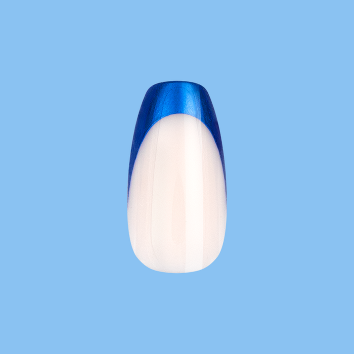 Blue Metallic French - Press-On | Medium | Coffin showing single medium coffin false nail with metallic blue french tip on blue background