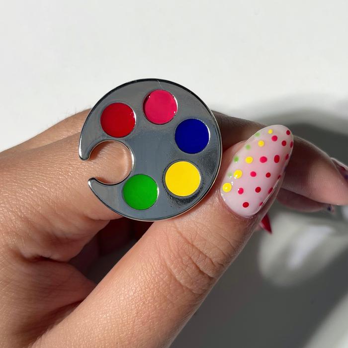 Bold Era liner polishes on a palette ring with polka dot nail art on a light skin tone