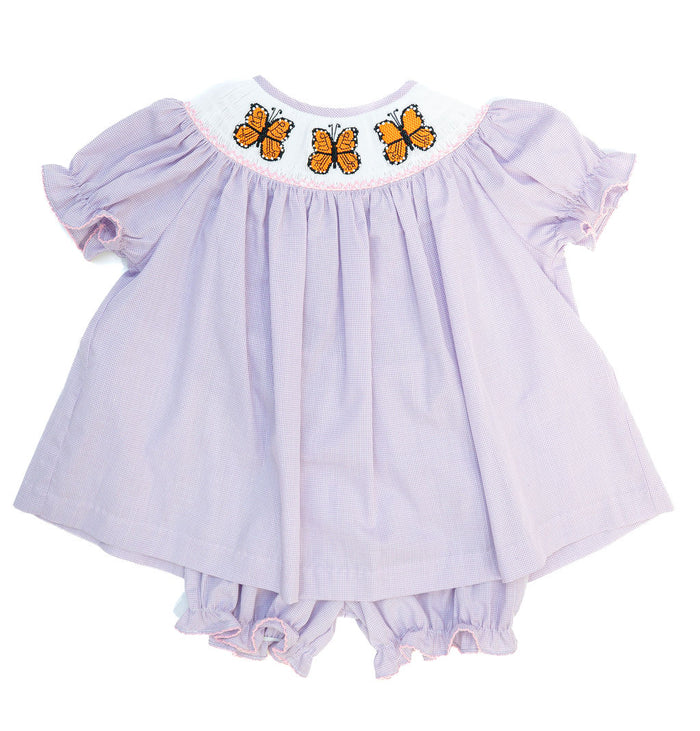 Smocked Monarch Butterfly Bloomer Set in light purple micro gingham with a hand-smocked neckline of orange butterflies and coordinating diaper cover