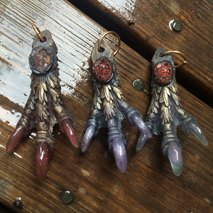 CAST MONSTER FOOT PENDANTS