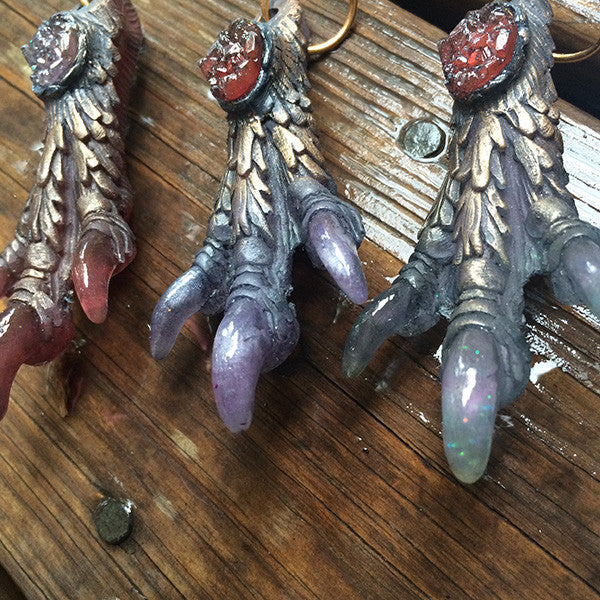 CAST MONSTER FOOT PENDANTS