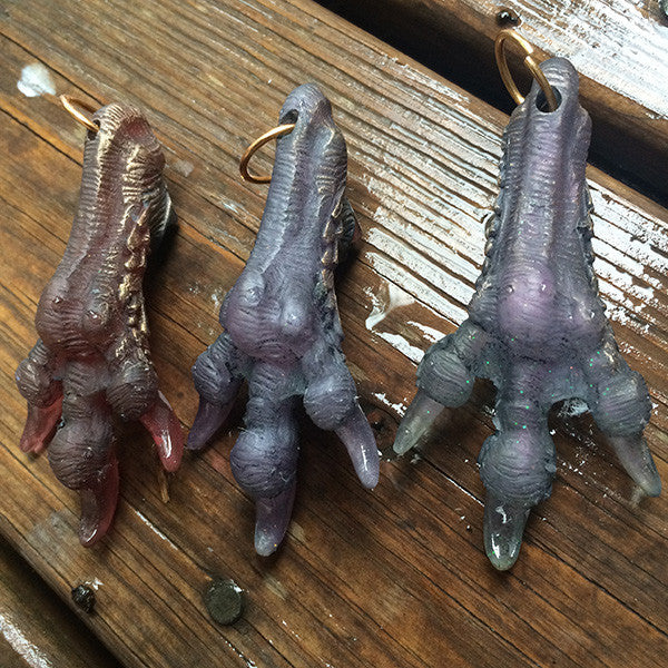 CAST MONSTER FOOT PENDANTS