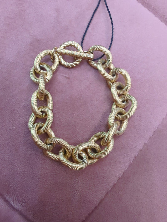 Mia Accessories chunky chain link bracelet with large interconnected metal links on a neutral background