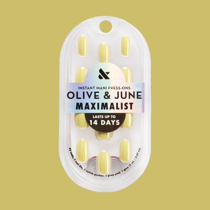 Citrus Chrome - Press-On | Short | Round showing bright yellow shimmery chrome short round false nails in packaging