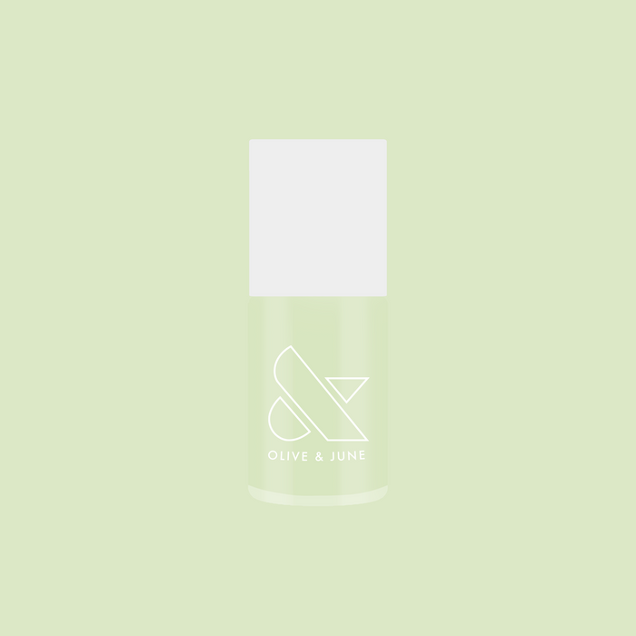 Corrigan mint pastel green nail polish bottle on a soft green background for an easy at-home mani by Olive and June