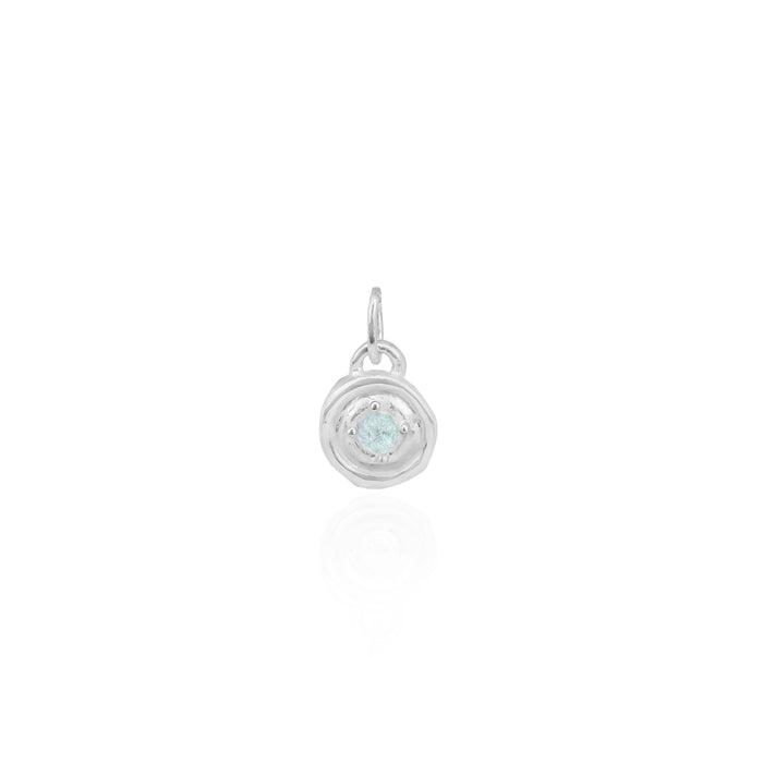 Silver pendant with a gemstone on a white background