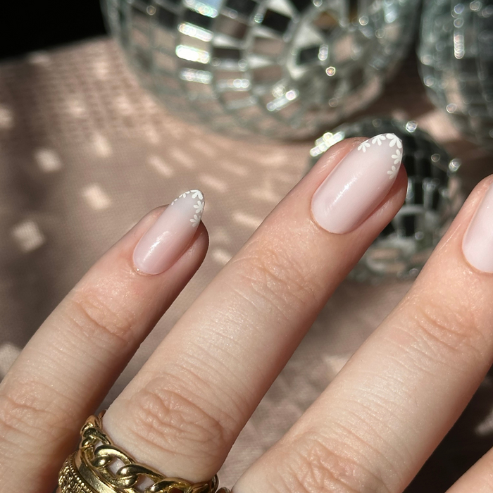 Delicate Daisy French - Press-On | Medium | Almond with sheer pink nails and white daisy French tip design for mani