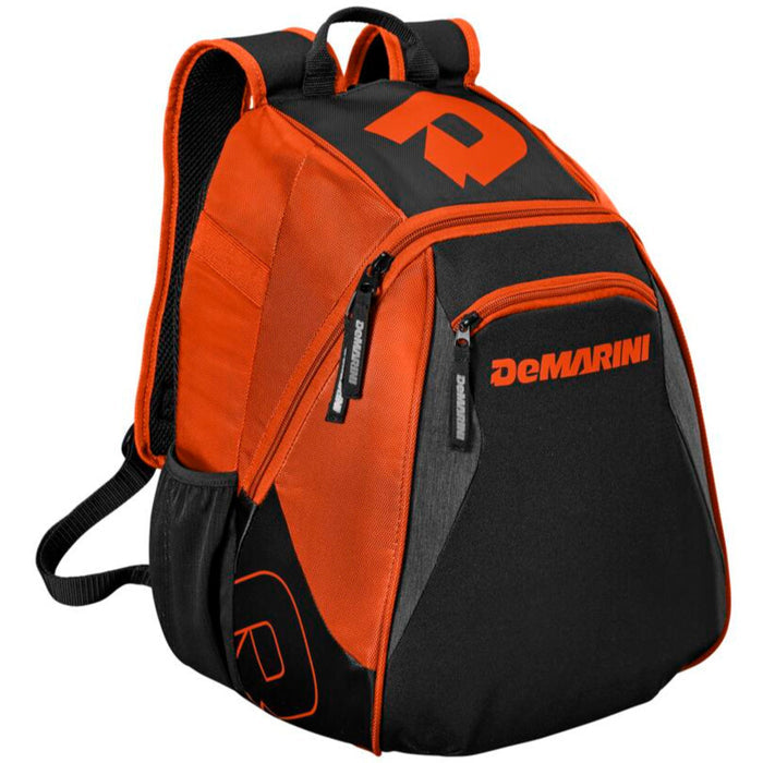 The DeMarini Voodoo Junior Backpack (WTD9106) is a black and orange youth baseball bag featuring multiple zippered compartments, padded shoulder straps, and the DeMarini logo on the front and side.