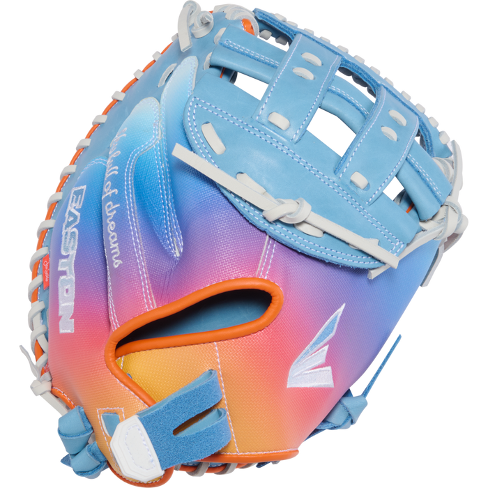 The Easton Jen Schro MYWHY 33" Fastpitch Catcher's Mitt features a vibrant blue, purple, pink, and orange gradient with white laces and blue accents. Crafted from premium Diamond Pro steerhide with "EASTON" and "Field of Dreams" script.
