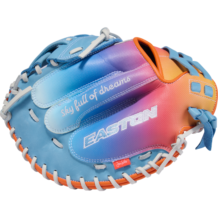 The Easton Jen Schro MYWHY 33" Fastpitch Catcher's Mitt features a vibrant blue, purple, pink, and orange gradient, white lacing, plus "sky full of dreams" and EASTON printed on this premium catcher's mitt.