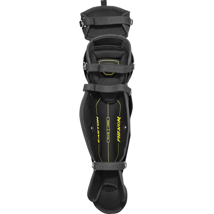 A black and yellow Easton Phenom Catcher’s Leg Guard (model PHENOMLG) featuring adjustable straps and built-in knee padding, designed for sports, displayed from above on a white background.