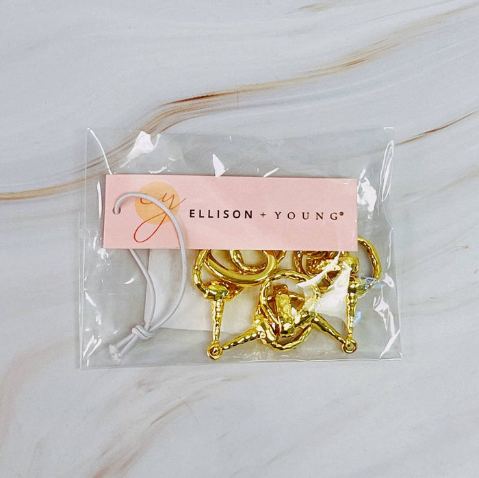 Ellison+Young equestrian linked bracelet with metal chain and horse-themed charms, stylish jewelry accessory.