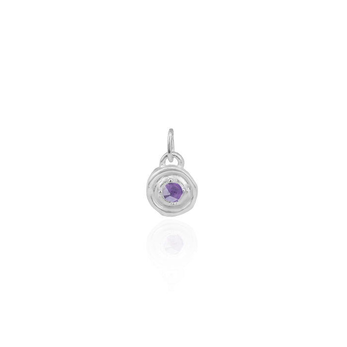 Silver pendant with a purple gemstone on a white background