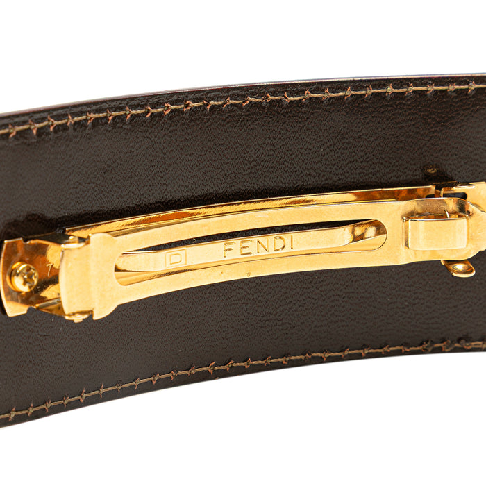 Fendi Zucca canvas barrette hair clip with Fendi logo accents, stylish accessory for hair styling and fashion.