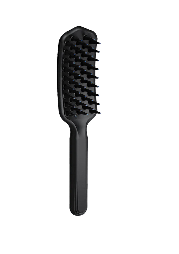 Black hairbrush on a white background