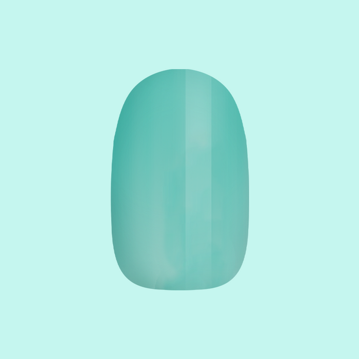 Fresh Aqua - Press-On | Short | Round showing single short round false nail in solid green-blue shade on pale blue background