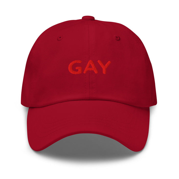 Red cap with 'GAY' text on a white background