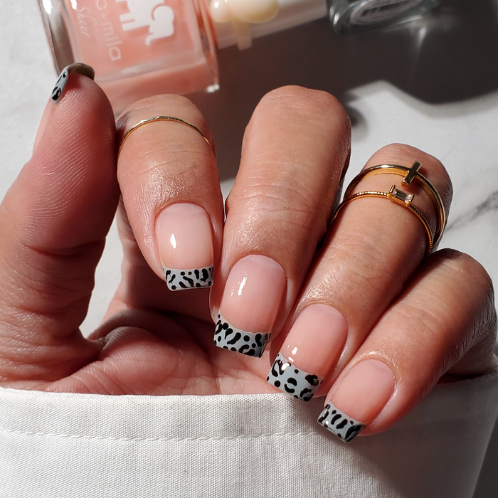 Grey Skies grey nail polish leopard-print French tips with gold rings