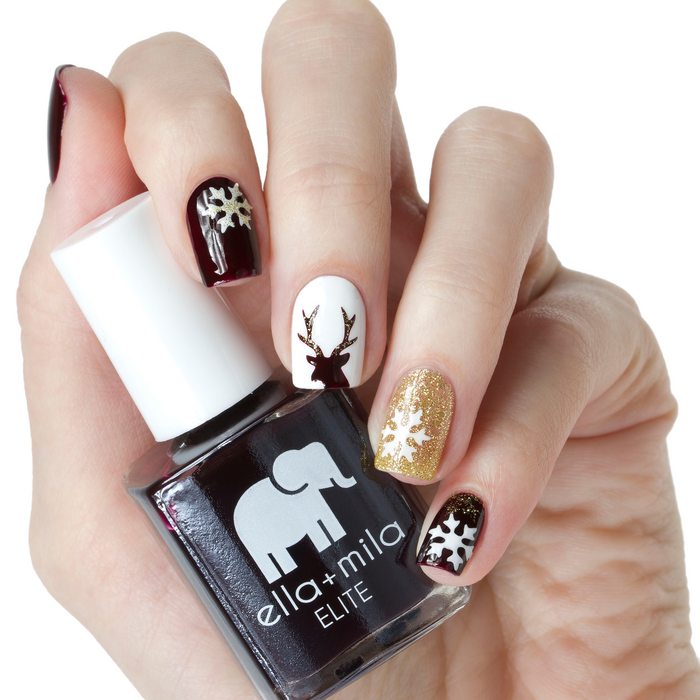 Holiday Fling burgundy nail polish with reindeer and snowflake holiday nail art