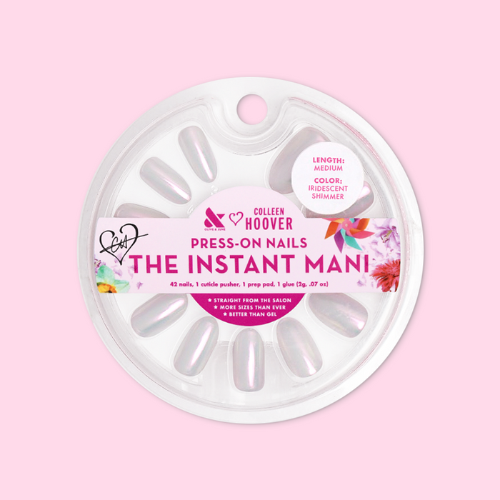 Iridescent Shimmer - Press-On | Medium | Oval showing medium oval iridescent shimmer false nails in circular packaging against pink background
