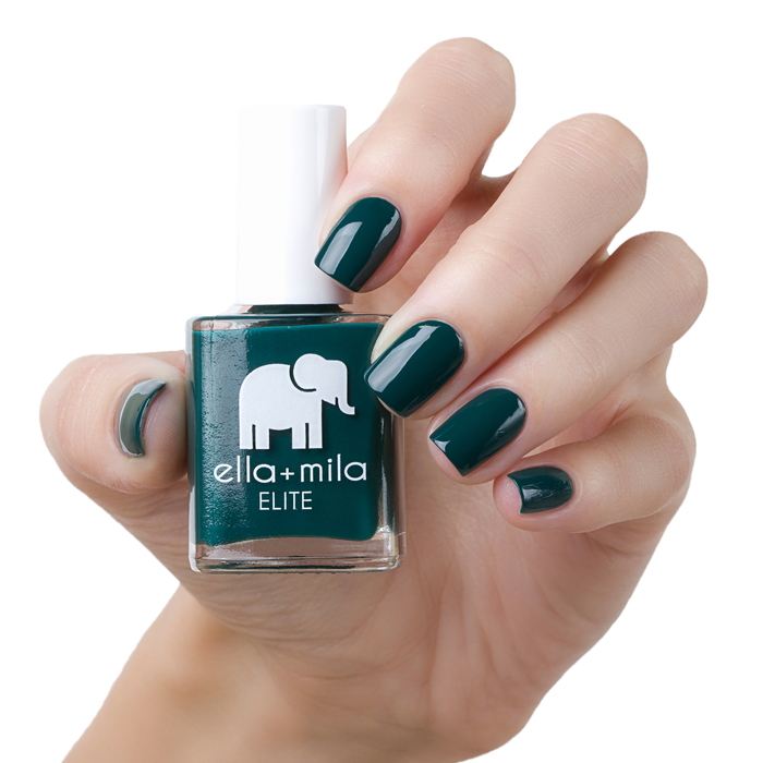Island Hopping deep sea green nail polish manicure on a light skin tone with the bottle