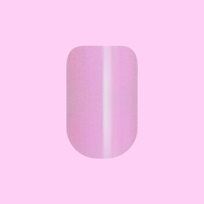 Island Time - Press-On | Short | Squoval single short squoval sheer lilac purple shimmer false nail on pink background