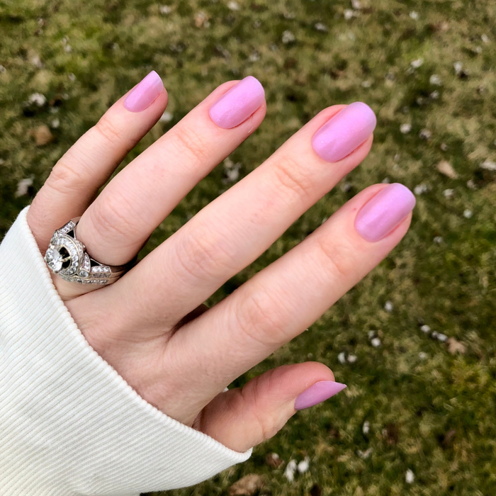 Island Time - Press-On | Short | Squoval showing hand outdoors with short squoval sheer lilac purple press-on manicure