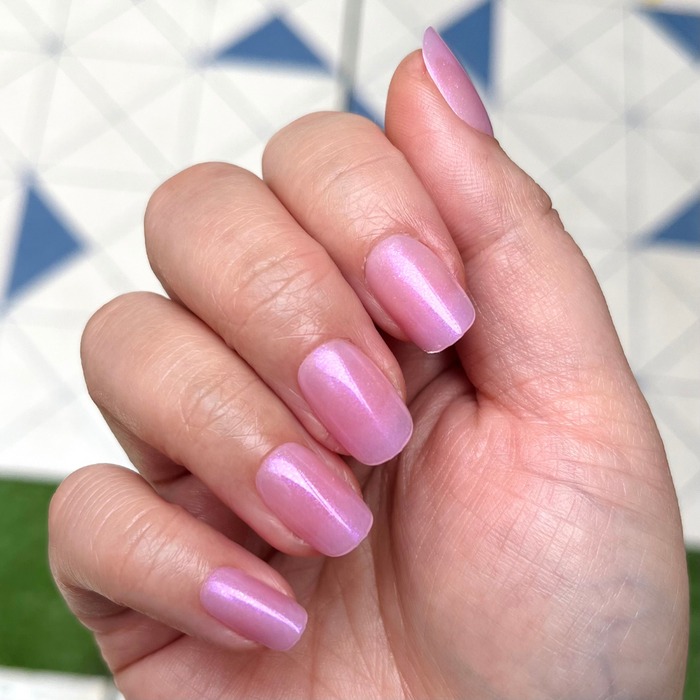 Island Time - Press-On | Short | Squoval showing hand with short squoval sheer lilac purple shimmery press-on manicure