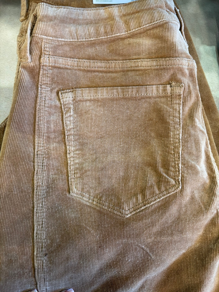 Vervet khaki barrel corduroy jeans displayed on a model, showcasing the relaxed fit and textured corduroy fabric.