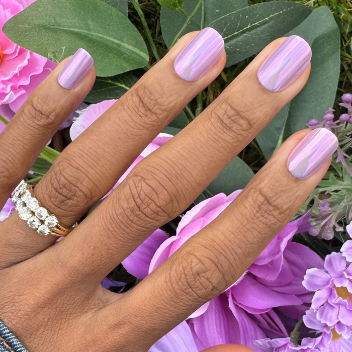 Lavender Chrome - Press-On | Short | Squoval showing short squoval press-on nails with shiny lavender chrome finish on hand