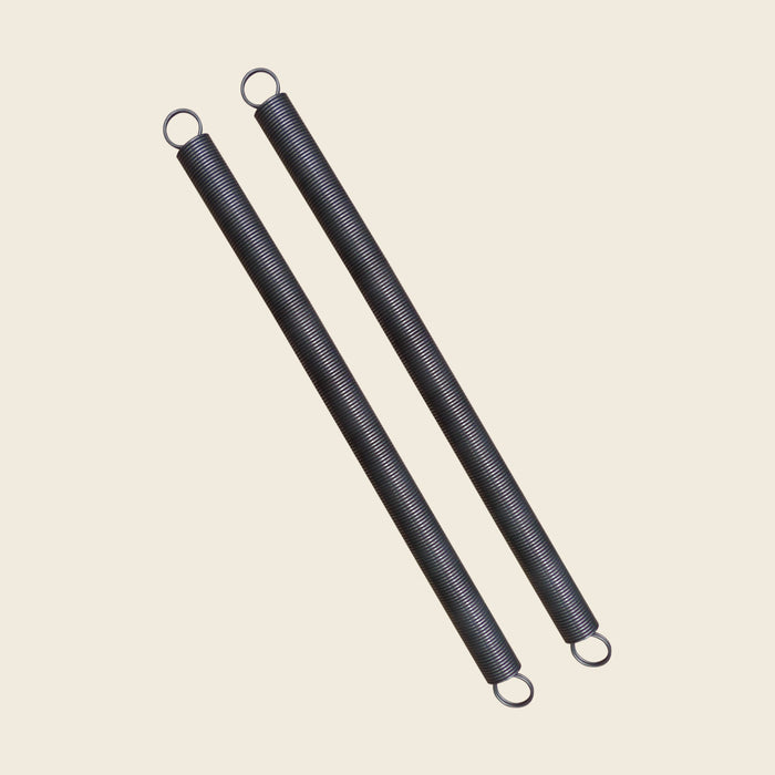 Pair of black Gratz Pilates leg springs with looped ends for Cadillac apparatus.