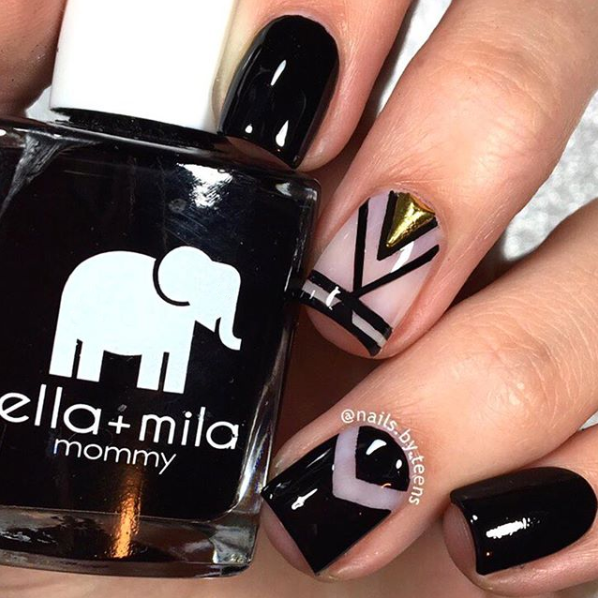 Lights Out black nail polish with white and gold geometric nail art