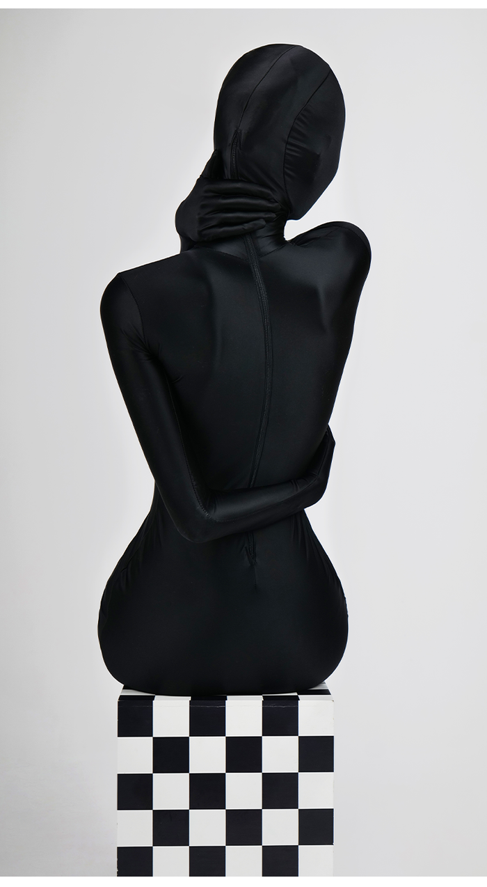Dark glossy high-shine full catsuit zentai by InTheMask by MOLIS, featuring a sleek, form-fitting design with a smooth, reflective finish.