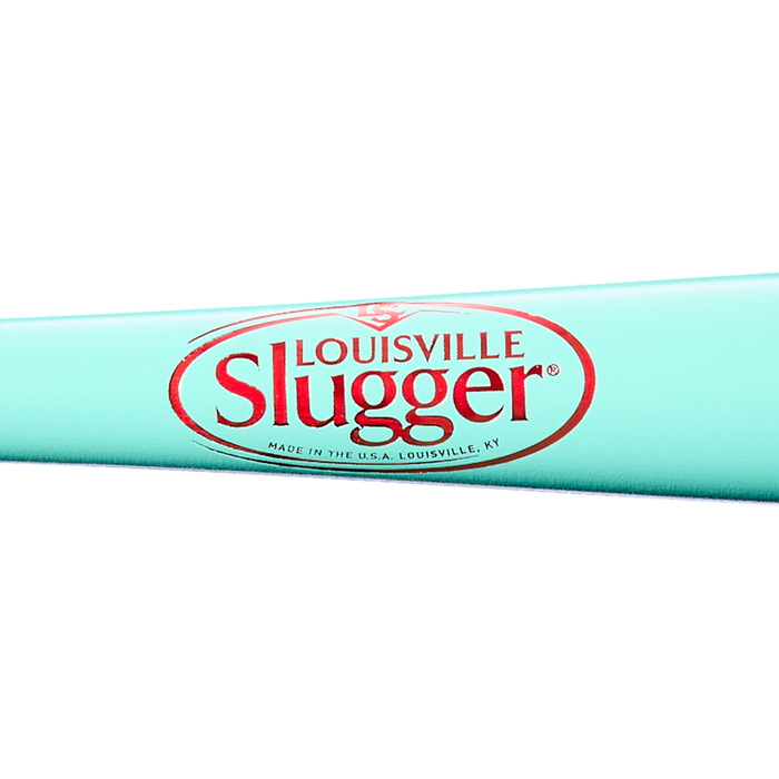 A close-up of the Louisville Slugger Genuine MIX Mint Wood Baseball Bat (WBL4191010) in turquoise, featuring the iconic red and white Louisville Slugger logo with “Made in the U.S.A. Louisville, KY” beneath it. This classic wood bat is made by Louisville Slugger for a balanced swing weight, making it perfect for serious players who value precision and performance.