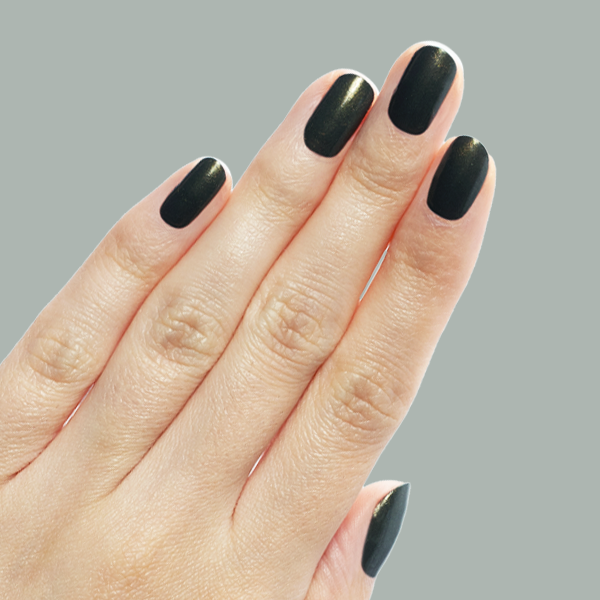 Hand with short nails painted in Martini Chrome gel polish showing deep olive green with golden shimmer manicure