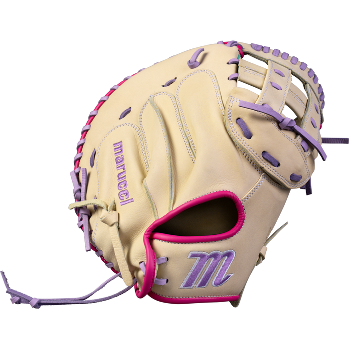 The Marucci Acadia 230C2 33″ Fastpitch Catcher’s Mitt (MFG4ACFP230C2-C/LP) features a tan design with purple and pink accents, crafted from durable full-grain cowhide leather. It showcases striking purple laces, the word “marucci” embroidered in purple on the thumb area, and the letter “M” stitched in purple and white near the wrist opening, making this Marucci mitt both stylish and high-performing for fastpitch catchers.