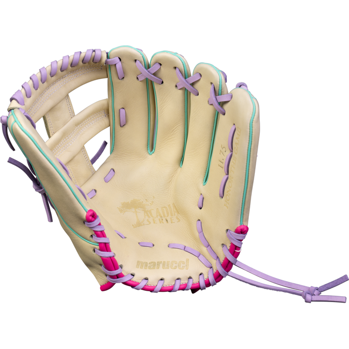 The Marucci Acadia 44A5 11.75″ Fastpitch Glove (MFG4ACFP44A5-CM/LP) is an infield glove crafted from full-grain cowhide leather in beige, featuring purple laces, pink accents, and teal trim. The glove is shown open with prominent Marucci branding and detailed stitching.
