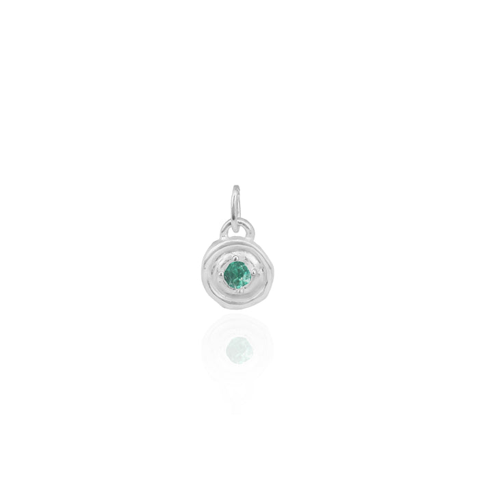 Silver pendant with a green gemstone on a white background