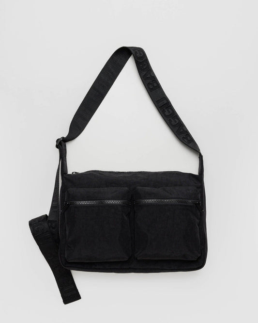 Black medium cargo crossbody bag with two front zip pockets and adjustable strap.