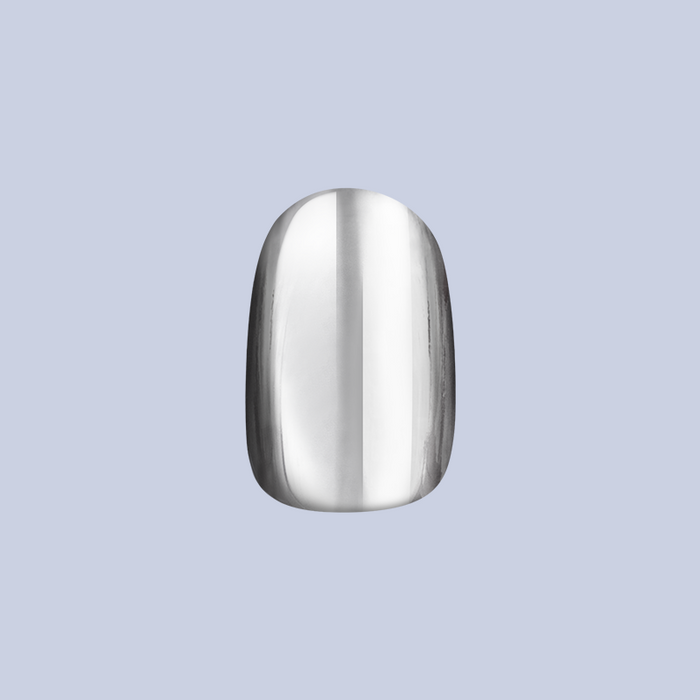 Mirror Chrome - Press-On | Extra Short | Round showing a single extra short round press-on nail with shiny mirror chrome finish