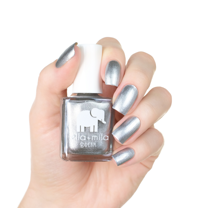Mirror Mirror metallic silver nail polish manicure on a light skin tone with the bottle